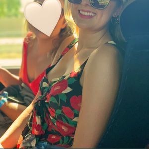 Black Red Floral Romper All in Favor.